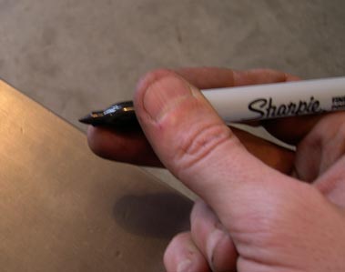 how to hold a marker to scribe an even line