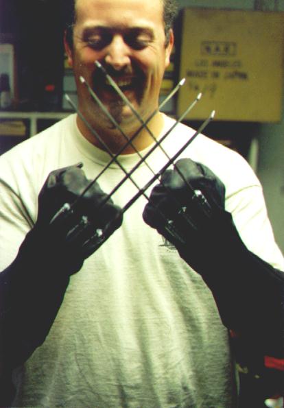 Smiling customer with Wolverine claws